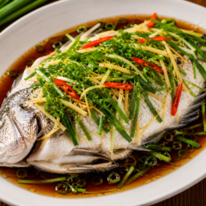 Steamed fish with ginger and chili